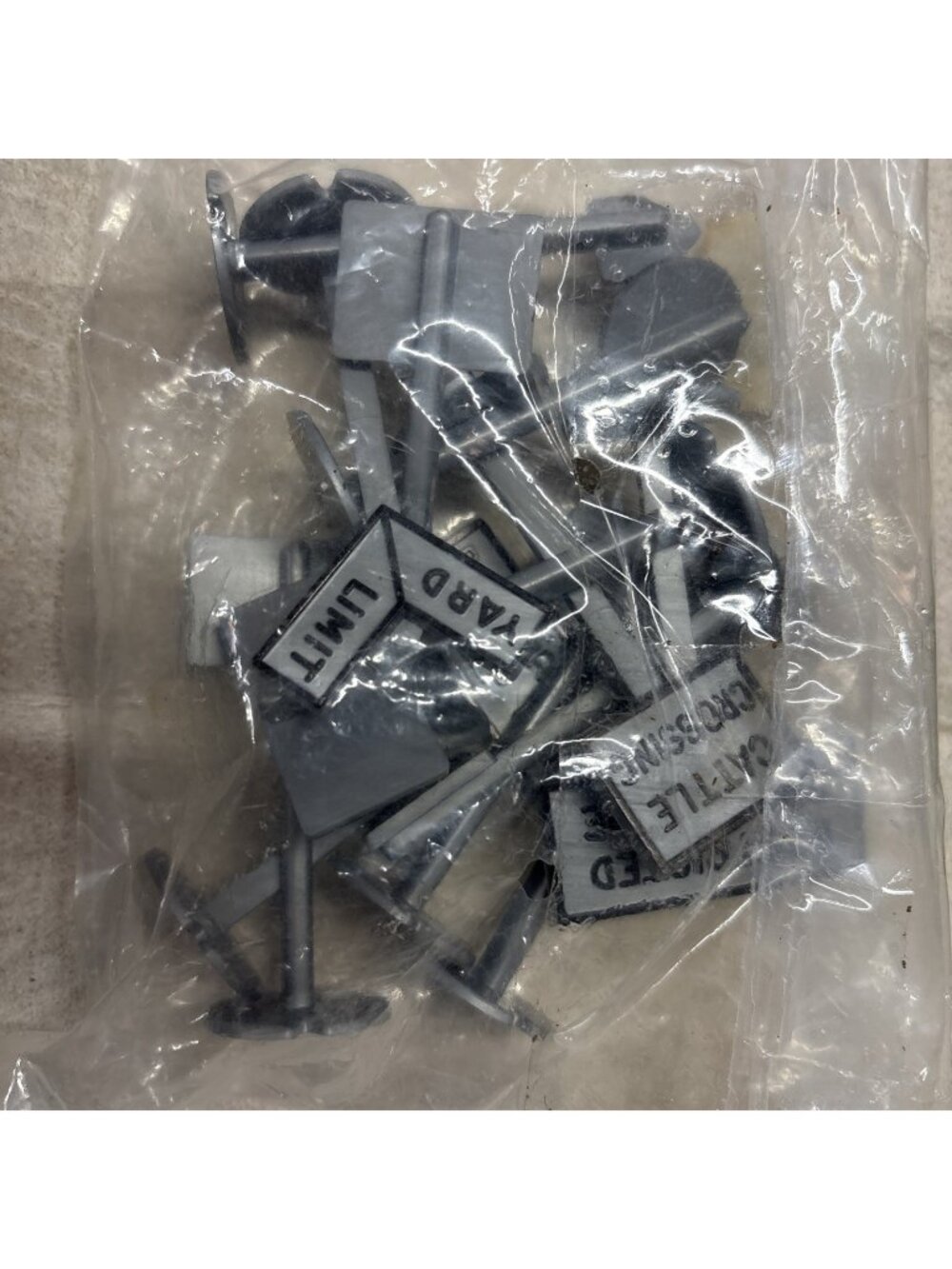 Lot of 10 Vintage O Scale Gray Plastic Road or Track Side Signs New Sealed Bag